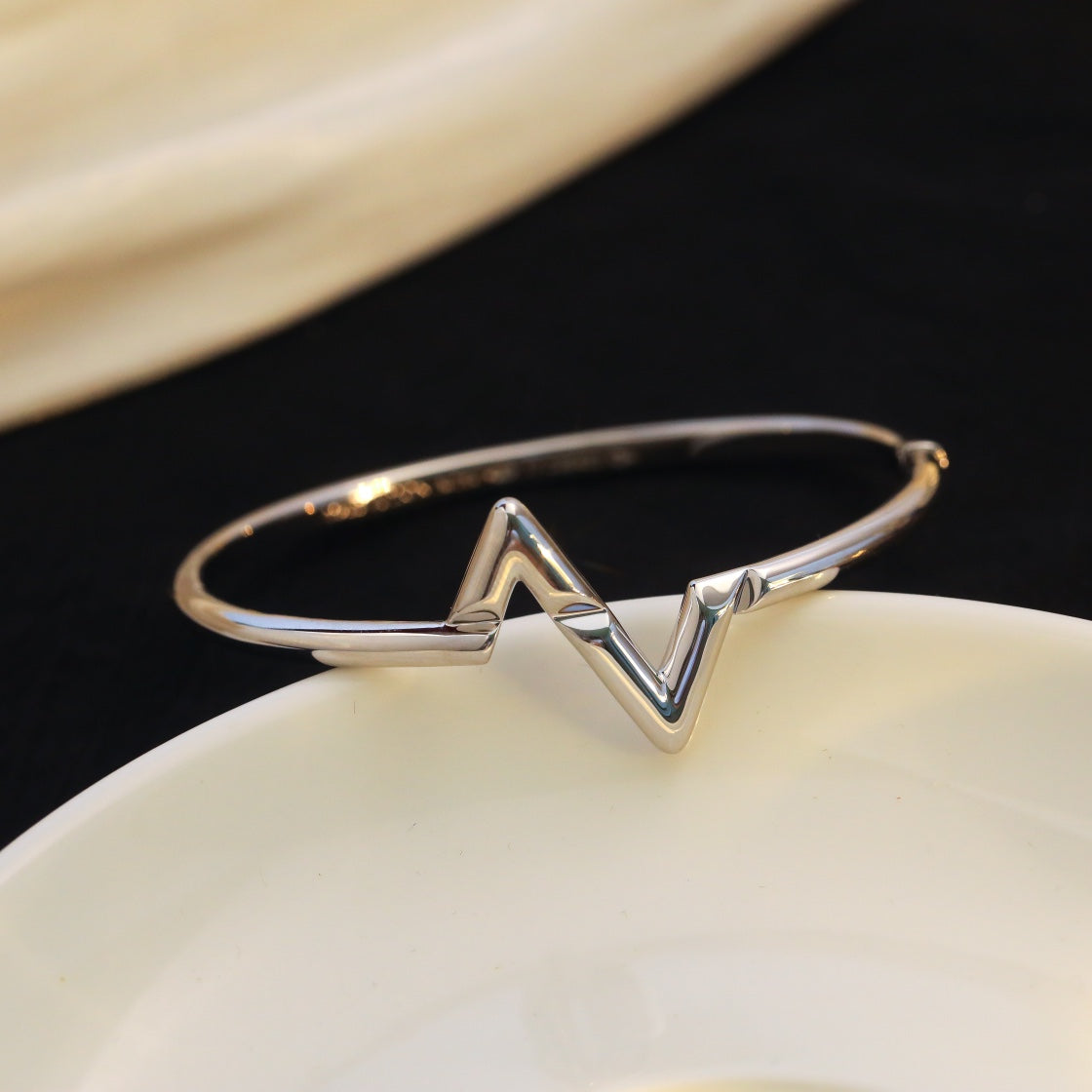 [ECHO ]VOLTE UPSITE DOWN BRACELET