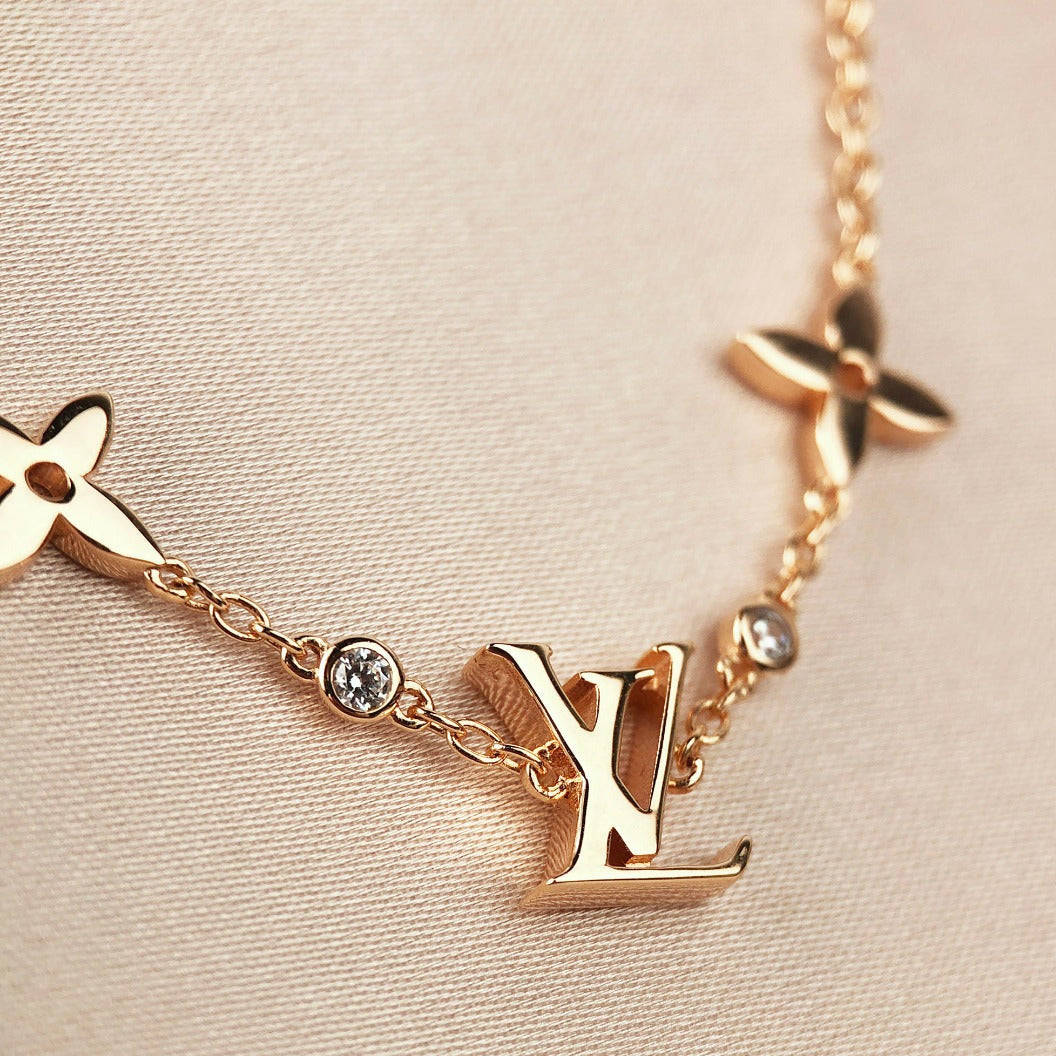 [ECHO ]STAR AND SUN 7 MOTIFS GOLD BRACELET