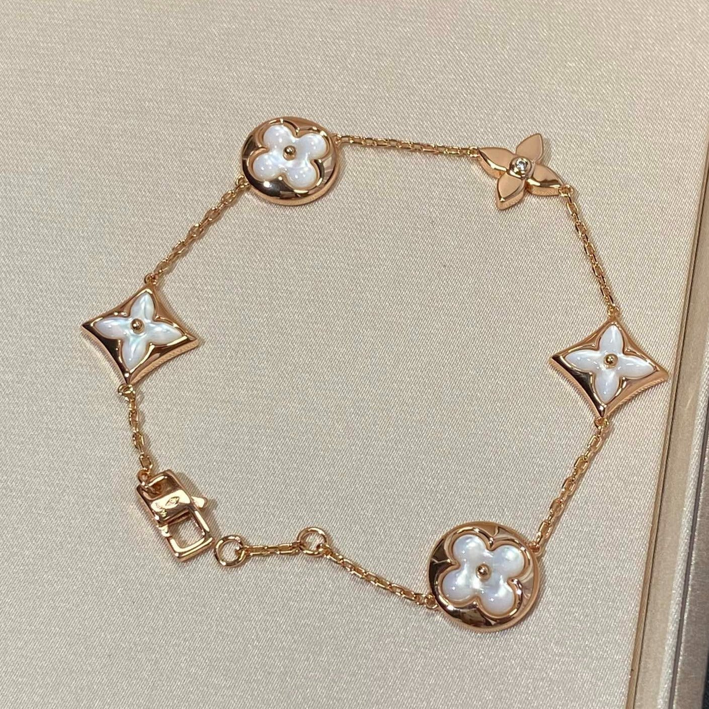 [ECHO ]STAR AND SUN 5 MOTIF MOP PINK GOLD BRACELET
