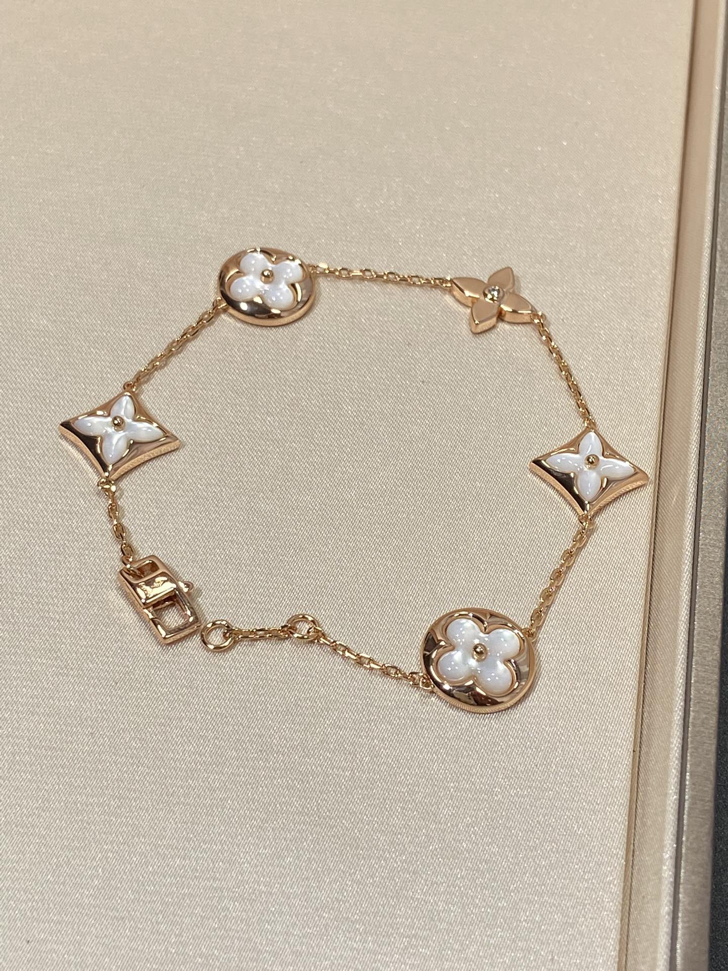[ECHO ]STAR AND SUN 5 MOTIF MOP PINK GOLD BRACELET