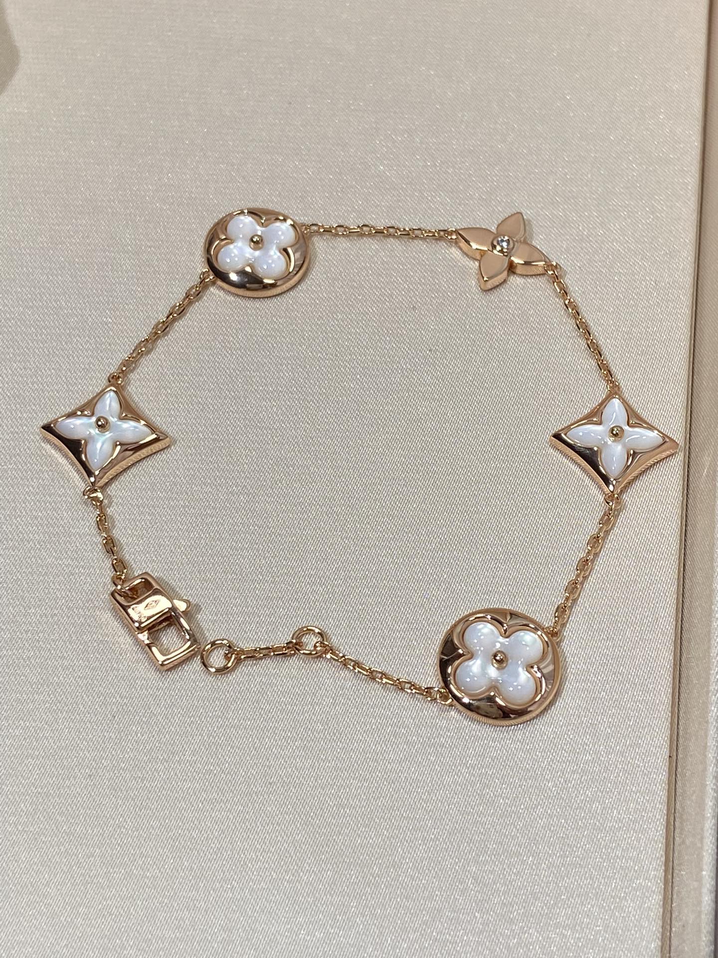 [ECHO ]STAR AND SUN 5 MOTIF MOP PINK GOLD BRACELET