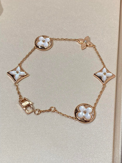 [ECHO ]STAR AND SUN 5 MOTIF MOP PINK GOLD BRACELET