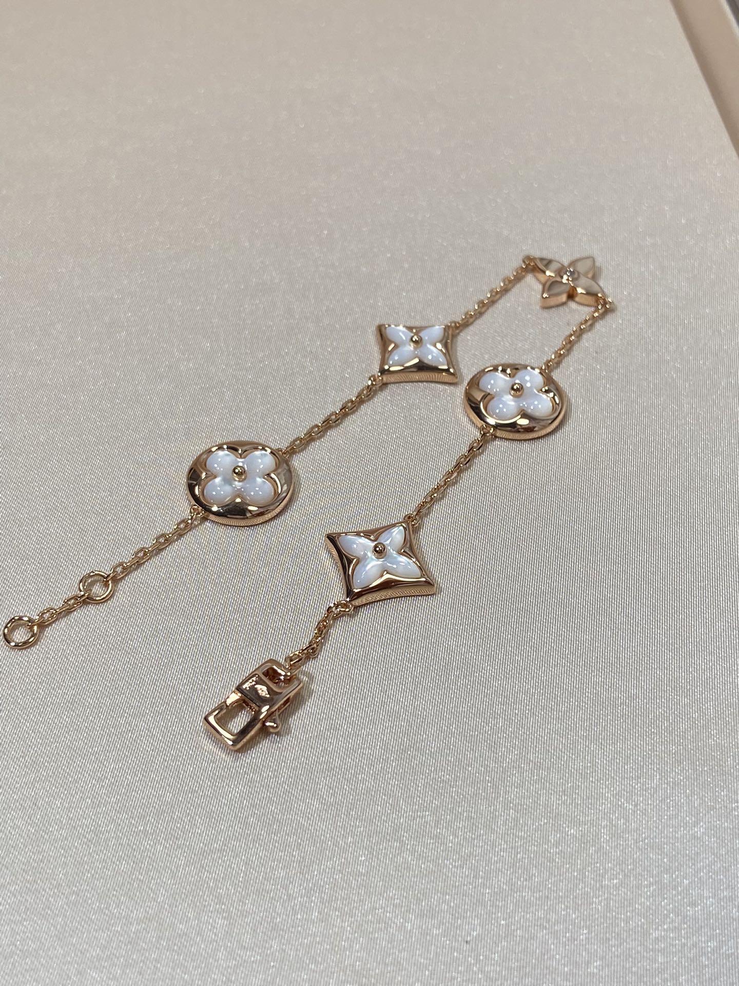 [ECHO ]STAR AND SUN 5 MOTIF MOP PINK GOLD BRACELET