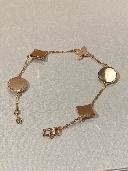 [ECHO ]STAR AND SUN 5 MOTIF MOP PINK GOLD BRACELET