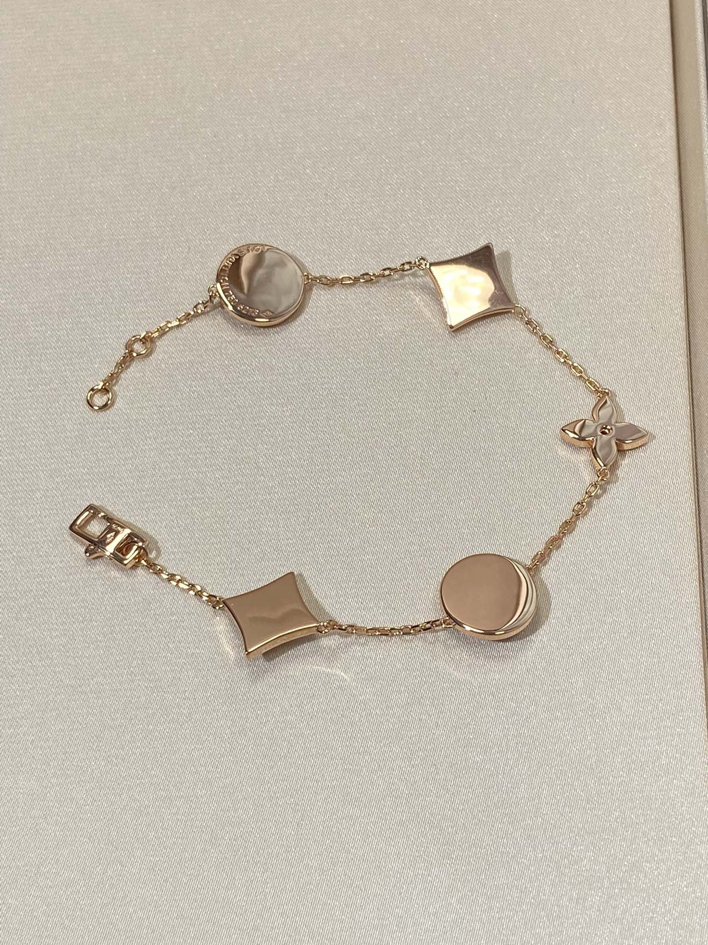 [ECHO ]STAR AND SUN 5 MOTIF MOP PINK GOLD BRACELET