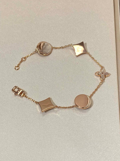[ECHO ]STAR AND SUN 5 MOTIF MOP PINK GOLD BRACELET