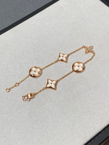 [ECHO ]STAR AND SUN 5 MOTIF MOP PINK GOLD BRACELET