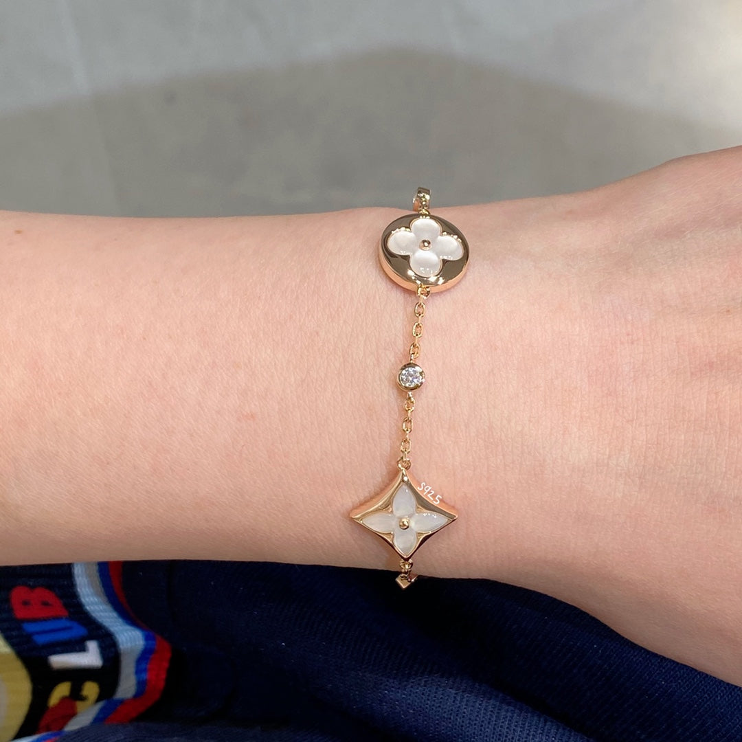 [ECHO ]STAR AND SUN 4 MOTIF WHITE MOP PINK GOLD BRACELET
