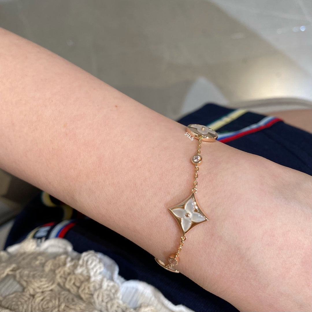 [ECHO ]STAR AND SUN 4 MOTIF WHITE MOP PINK GOLD BRACELET