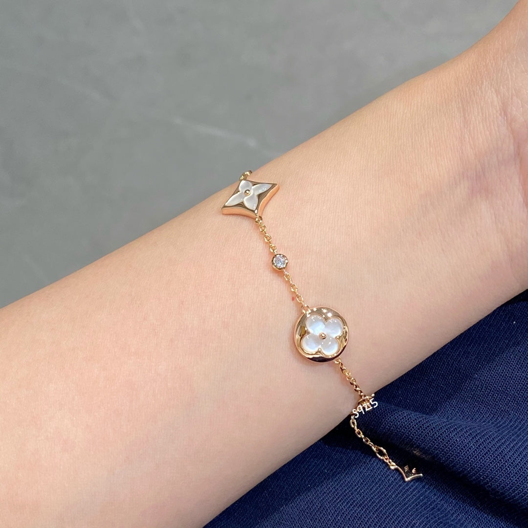 [ECHO ]STAR AND SUN 4 MOTIF WHITE MOP PINK GOLD BRACELET