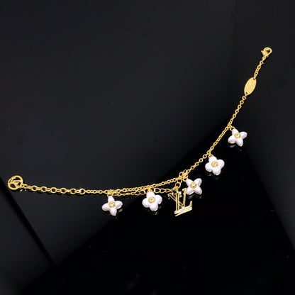 [ECHO ]LOGO 6 MOTIF STAR AND SUN GOLD BRACELET
