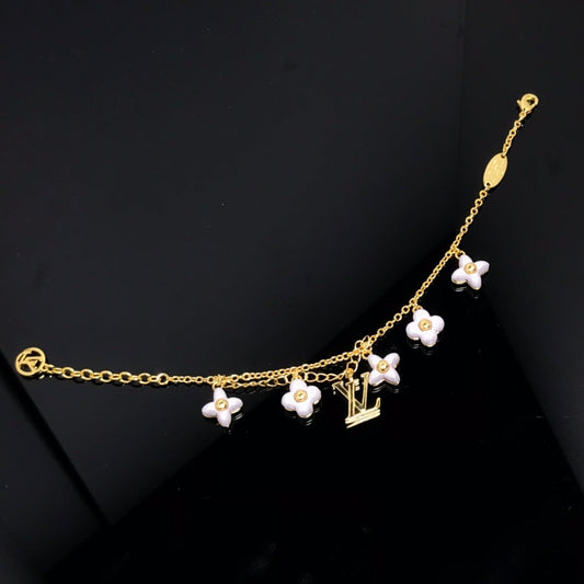 [ECHO ]LOGO 6 MOTIF STAR AND SUN GOLD BRACELET
