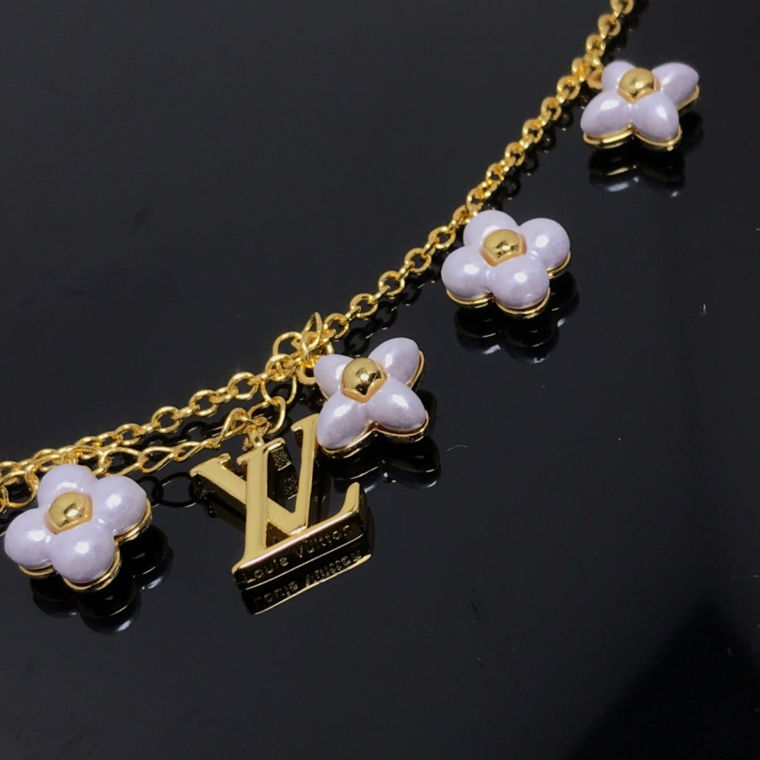 [ECHO ]LOGO 6 MOTIF STAR AND SUN GOLD BRACELET