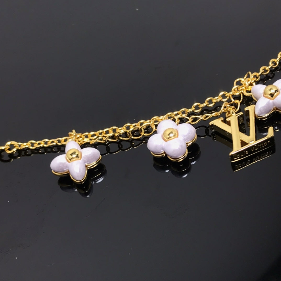 [ECHO ]LOGO 6 MOTIF STAR AND SUN GOLD BRACELET