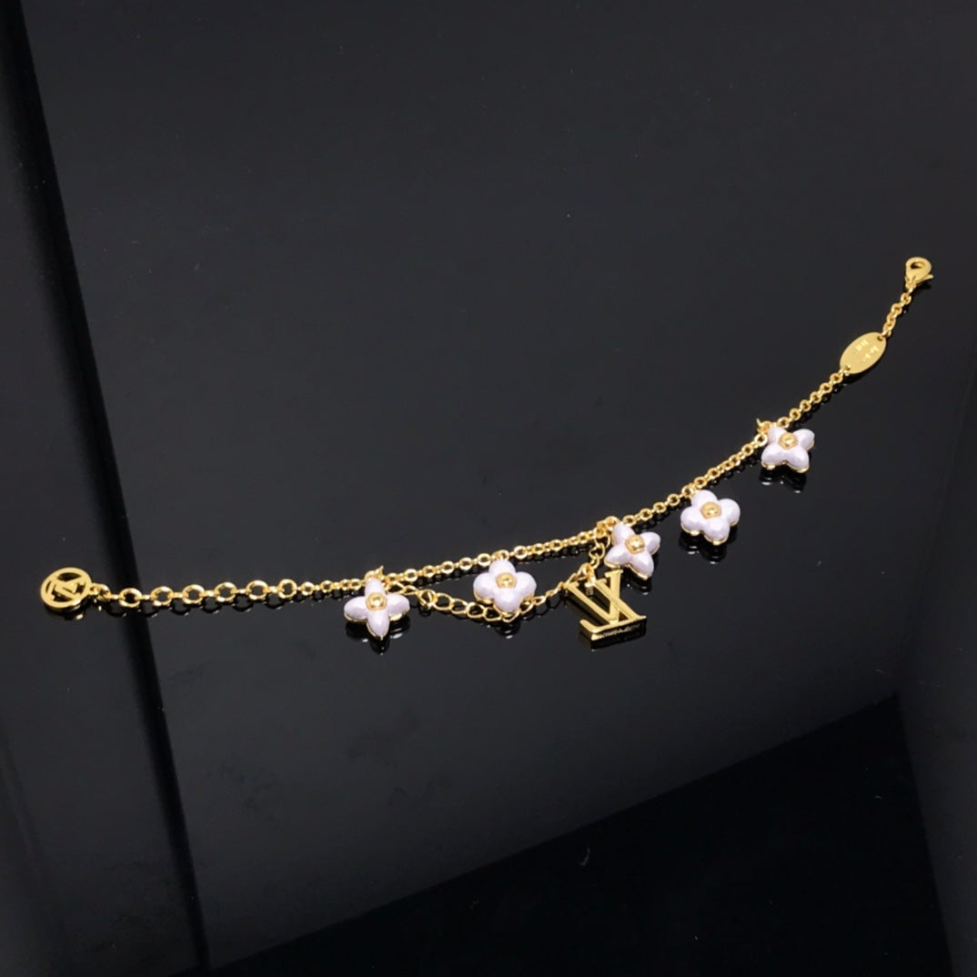 [ECHO ]LOGO 6 MOTIF STAR AND SUN GOLD BRACELET