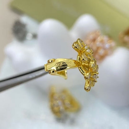 [ECHO ]THE FLOWERS ARE ALL STUDDED WITH STUD EARRINGS