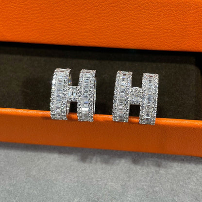 [ECHO ]H STUD EARRINGS WITH SILVER DIAMONDS
