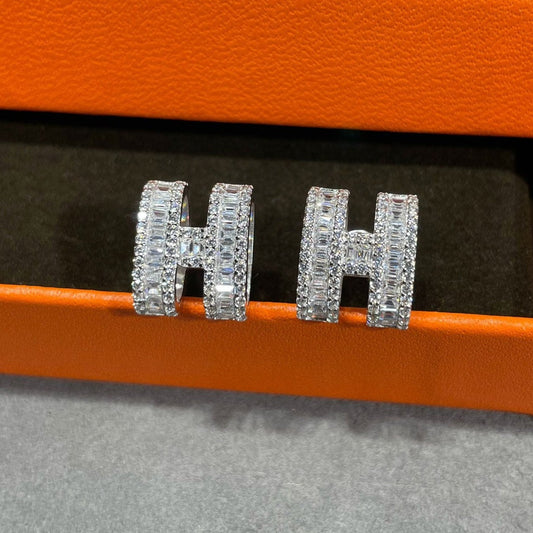 [ECHO ]H STUD EARRINGS WITH SILVER DIAMONDS